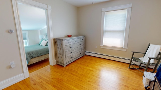 295 French St, Bangor, ME 04401 - sitting room with a baseboard radiator and light wood-style flooring