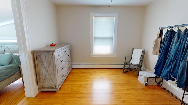 295 French St, Bangor, ME 04401 - living area featuring light wood-style flooring and baseboard heating