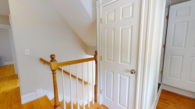 295 French St, Bangor, ME 04401 - stairs featuring wood finished floors and baseboards