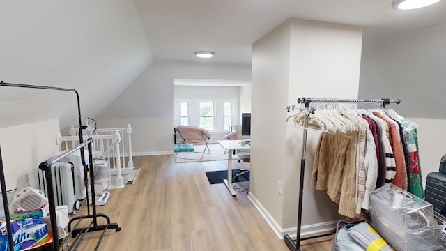 295 French St, Bangor, ME 04401 - walk in closet with wood finished floors and vaulted ceiling