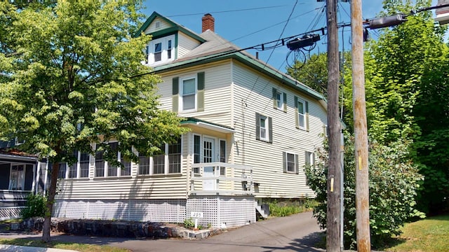 295 French St, Bangor, ME 04401 - view of property exterior featuring a chimney