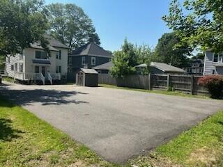 295 French St, Bangor, ME 04401 - exterior space with a storage shed and driveway