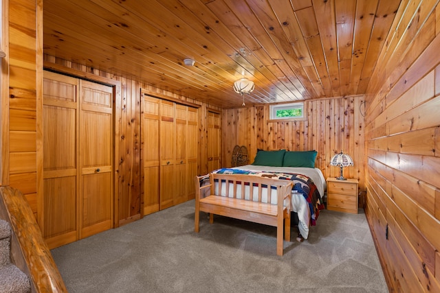 320 Commons Dr, Bridgton, ME 04009 - carpeted bedroom with wood walls and wooden ceiling