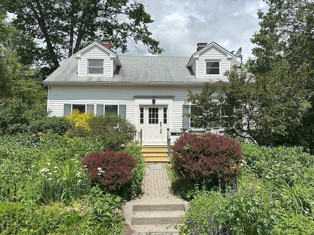 14 Pond St, Orono, ME 04473 - cape cod house featuring a chimney