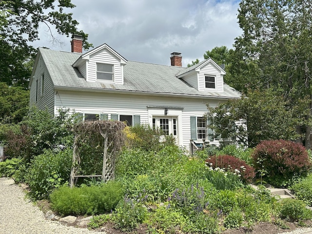 14 Pond St, Orono, ME 04473 - view of front of property with a chimney
