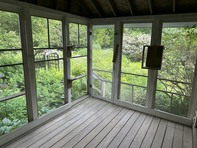 14 Pond St, Orono, ME 04473 - unfurnished sunroom featuring a wooden deck, hardwood / wood-style flooring, and vaulted ceiling
