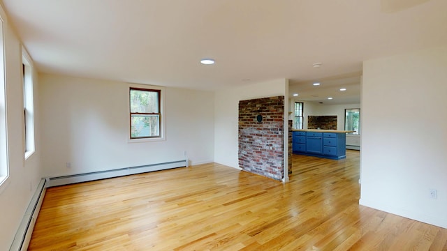 14 Pond St, Orono, ME 04473 - spare room featuring light wood-style flooring, baseboard heating, and recessed lighting