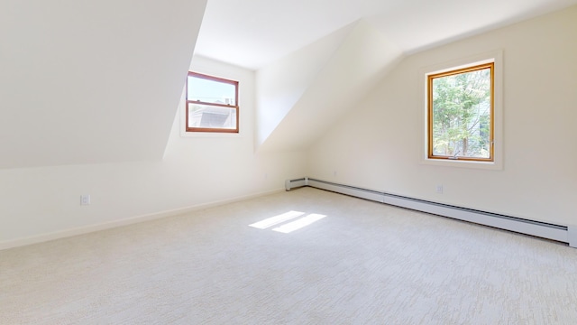 14 Pond St, Orono, ME 04473 - bonus room featuring baseboard heating, vaulted ceiling, and carpet flooring