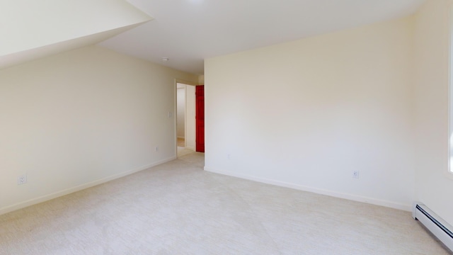 14 Pond St, Orono, ME 04473 - empty room with a baseboard radiator and light carpet