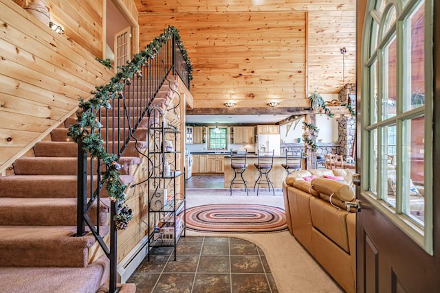309A Cushman Rd, Woodstock, ME 04219 - entrance foyer with wooden walls and stairway