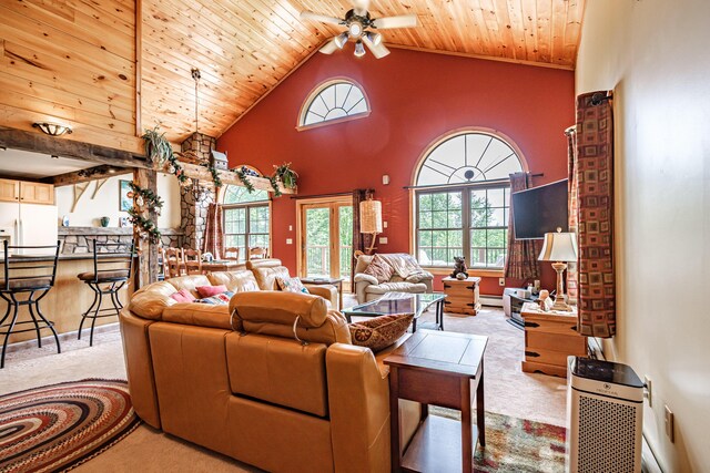 309A Cushman Rd, Woodstock, ME 04219 - living area featuring carpet flooring, wood ceiling, ceiling fan, high vaulted ceiling, and a baseboard heating unit