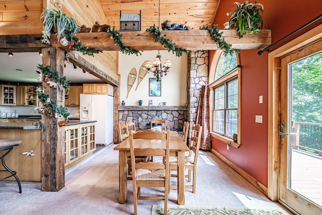 309A Cushman Rd, Woodstock, ME 04219 - dining room featuring light carpet and a chandelier