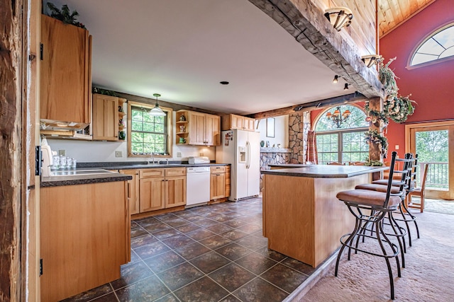 309A Cushman Rd, Woodstock, ME 04219 - kitchen with white appliances, dark countertops, open shelves, and healthy amount of natural light
