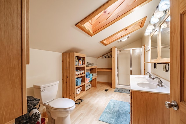 309A Cushman Rd, Woodstock, ME 04219 - full bathroom with a skylight, lofted ceiling, a shower stall, wood finished floors, and a baseboard heating unit