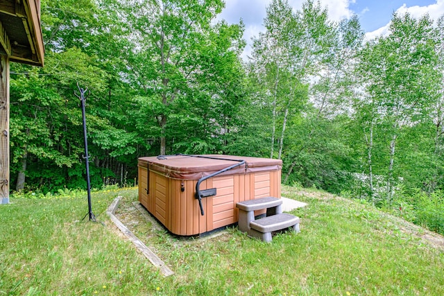 309A Cushman Rd, Woodstock, ME 04219 - view of green lawn with a hot tub