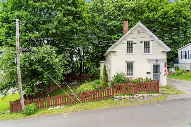 12 Robinson St, Gardiner, ME 04345 - view of front of property with a chimney