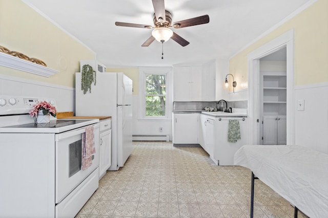 12 Robinson St, Gardiner, ME 04345 - kitchen with white electric range, baseboard heating, white cabinetry, ceiling fan, and light countertops