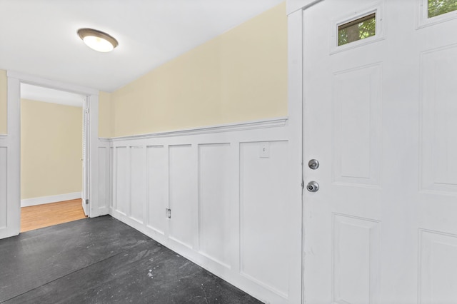 12 Robinson St, Gardiner, ME 04345 - corridor featuring wainscoting and a decorative wall