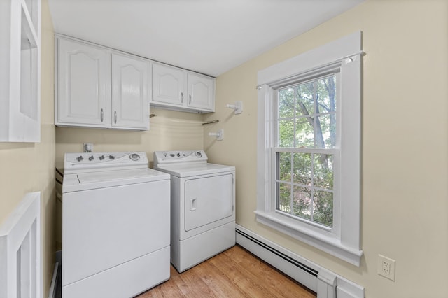 12 Robinson St, Gardiner, ME 04345 - washroom with cabinet space, separate washer and dryer, baseboard heating, and light wood finished floors