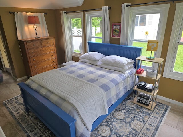 135 Hotel Rd, Auburn, ME 04210 - tiled bedroom featuring baseboards