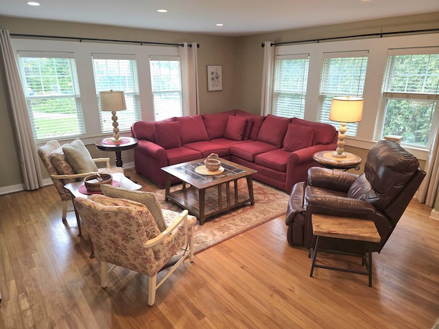 135 Hotel Rd, Auburn, ME 04210 - living room with light wood-style floors and recessed lighting