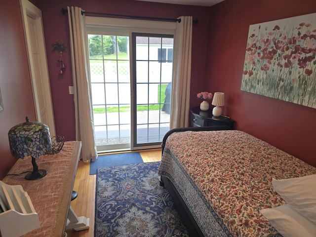 135 Hotel Rd, Auburn, ME 04210 - bedroom with access to outside and wood finished floors