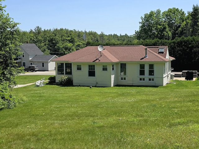 135 Hotel Rd, Auburn, ME 04210 - back of house featuring a yard