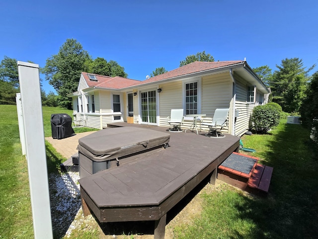 135 Hotel Rd, Auburn, ME 04210 - back of house with a covered hot tub, a yard, and a wooden deck