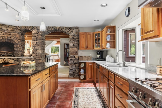 11 Everett Dow Dr, Woolwich, ME 04579 - kitchen featuring open shelves, brown cabinets, and dark stone counters