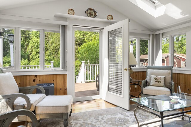 11 Everett Dow Dr, Woolwich, ME 04579 - sunroom / solarium with a skylight, vaulted ceiling, plenty of natural light, and wood finished floors