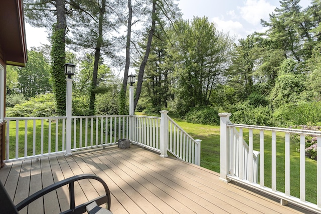 11 Everett Dow Dr, Woolwich, ME 04579 - wooden terrace featuring a yard and view of wooded area
