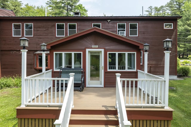 11 Everett Dow Dr, Woolwich, ME 04579 - back of property with a deck and a yard