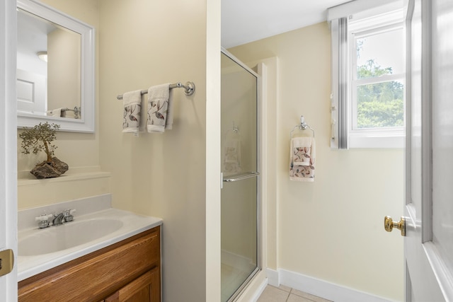 11 Everett Dow Dr, Woolwich, ME 04579 - bathroom featuring a shower stall, vanity, and tile patterned flooring