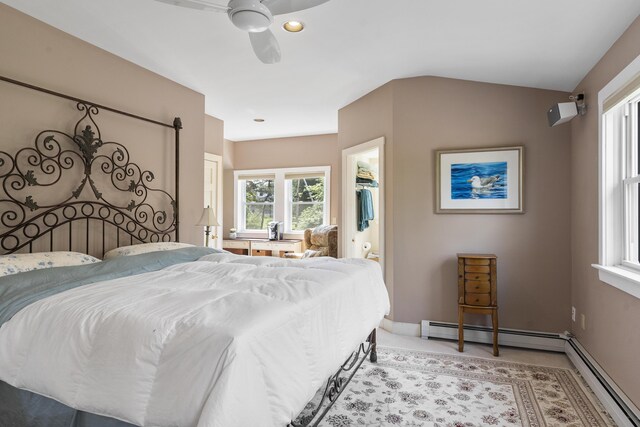 11 Everett Dow Dr, Woolwich, ME 04579 - bedroom featuring a baseboard heating unit, a spacious closet, a closet, ceiling fan, and recessed lighting