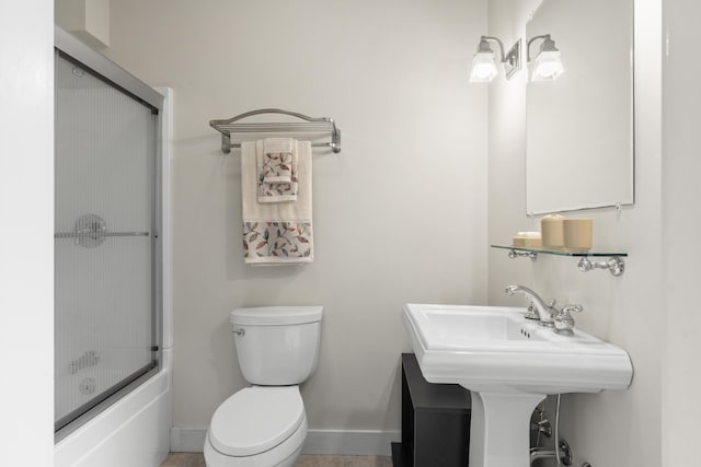11 Everett Dow Dr, Woolwich, ME 04579 - full bathroom featuring baseboards and shower / bath combination with glass door