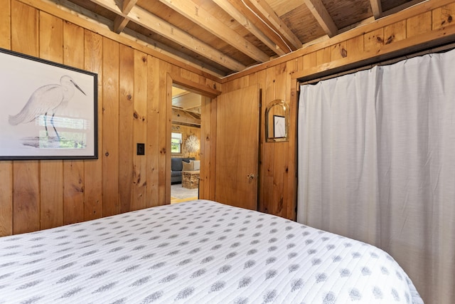 8 N Lakeview Dr, Litchfield, ME 04350 - bedroom with wood walls and beam ceiling