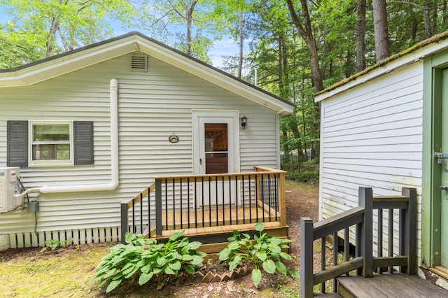 8 N Lakeview Dr, Litchfield, ME 04350 - back of property featuring a wooden deck