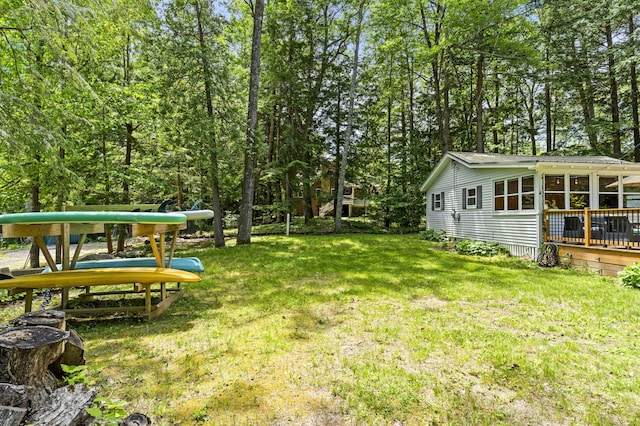 8 N Lakeview Dr, Litchfield, ME 04350 - view of green lawn featuring a sunroom