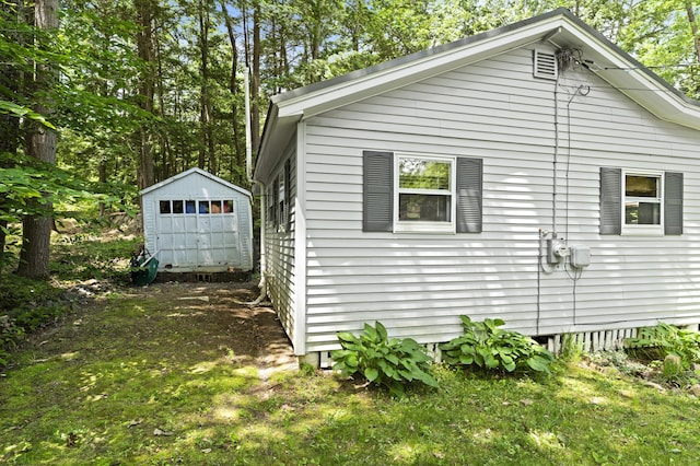 8 N Lakeview Dr, Litchfield, ME 04350 - view of property exterior with a storage shed