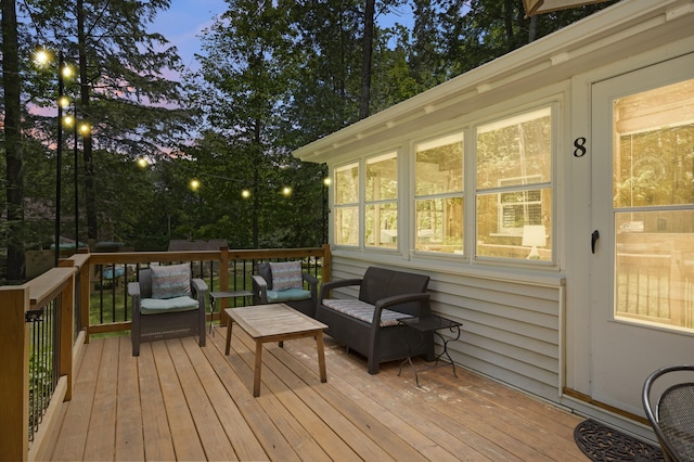 8 N Lakeview Dr, Litchfield, ME 04350 - wooden deck featuring an outdoor hangout area