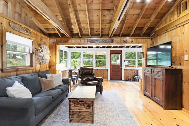 8 N Lakeview Dr, Litchfield, ME 04350 - living room with wooden ceiling, wood walls, and light wood-style floors