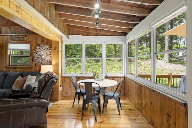 8 N Lakeview Dr, Litchfield, ME 04350 - sunroom / solarium with wood walls, plenty of natural light, hardwood / wood-style floors, and a wooden deck