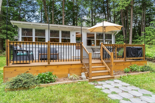 8 N Lakeview Dr, Litchfield, ME 04350 - back of property with a deck