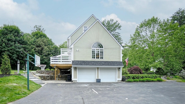 1 Daniels Way, Falmouth, ME 04105 - view of side of property with a garage, a shingled roof, driveway, and a wooden deck