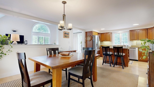 1 Daniels Way, Falmouth, ME 04105 - dining area featuring light wood-style flooring, recessed lighting, and a chandelier