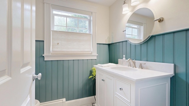 1 Daniels Way, Falmouth, ME 04105 - bathroom with a wainscoted wall, vanity, and a decorative wall