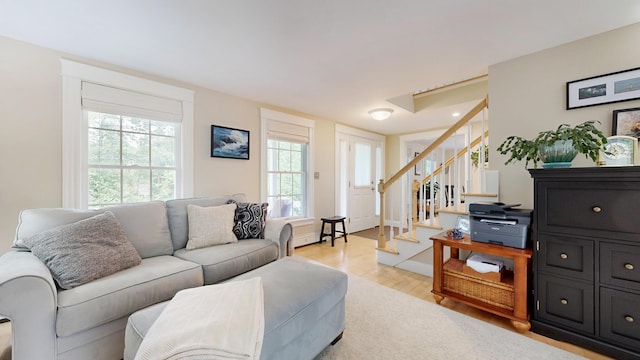 1 Daniels Way, Falmouth, ME 04105 - living area with light wood-style floors and stairway