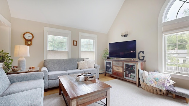 1 Daniels Way, Falmouth, ME 04105 - living room featuring plenty of natural light, high vaulted ceiling, and light wood-type flooring