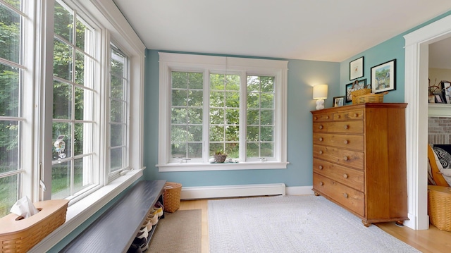1 Daniels Way, Falmouth, ME 04105 - sitting room with baseboard heating, healthy amount of natural light, and wood finished floors