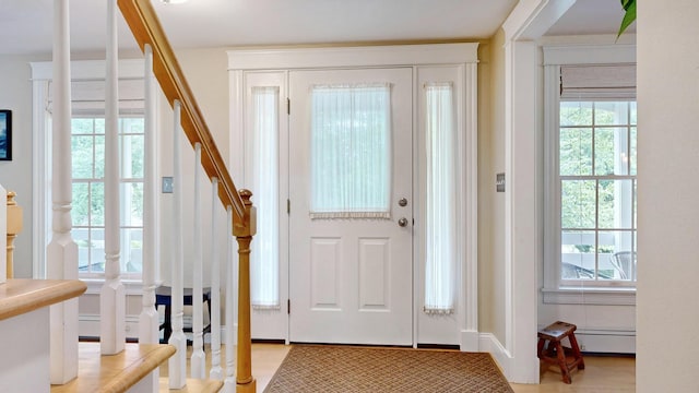1 Daniels Way, Falmouth, ME 04105 - foyer featuring stairway, healthy amount of natural light, and a baseboard radiator
